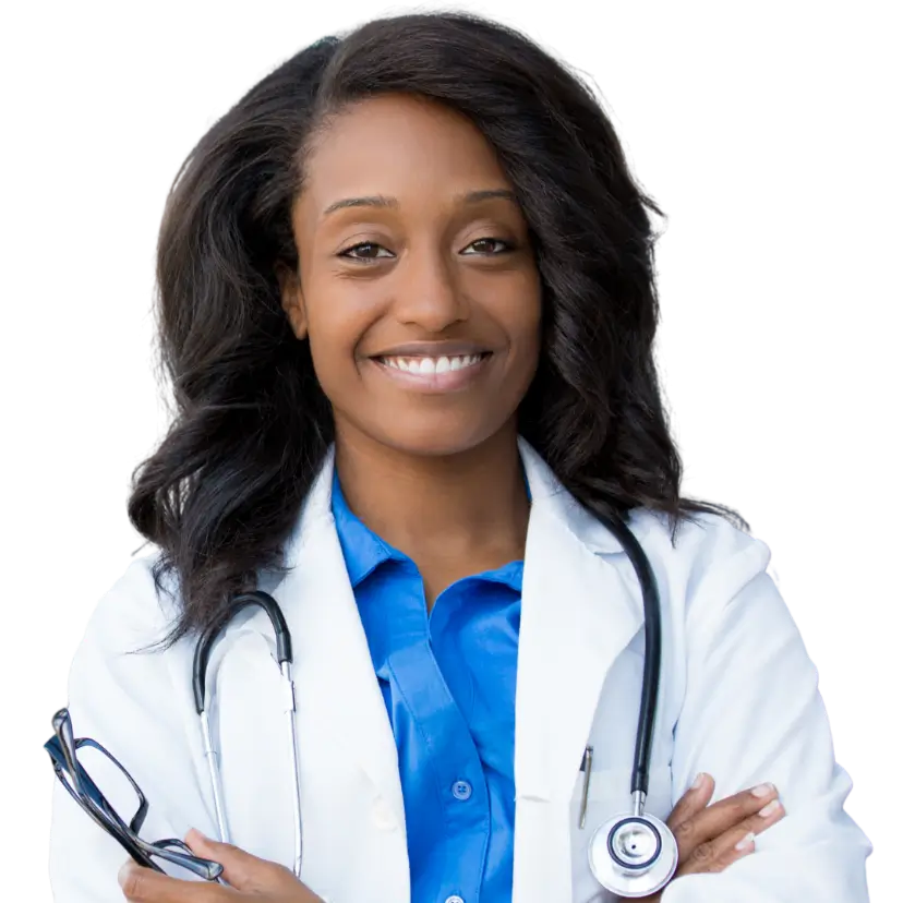 A smiling female doctor stands with her arms crossed, exuding confidence and professionalism in a clinical setting.